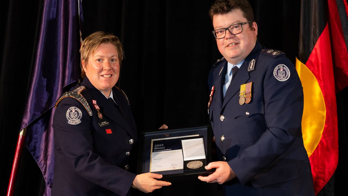 LEADERSHIP: Eaglehawk Captain Kylie Davis was awarded the Chief Officer Emerging Leader Award at the 2022 Spirit of CFA Awards, presented by Acting Chief Officer Gavin Thompson. Picture: BLAIR DELLEMIJN, UNIFORM PHOTOGRAPHY 