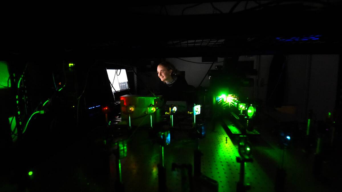 DISCOVERY: Honours student Abbey Milligan operates the high-tech microscope at La Trobe University. Picture: DARREN HOWE 