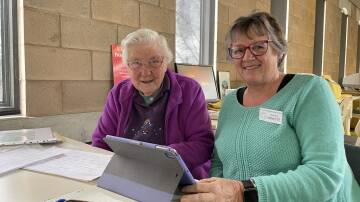 GENEALOGY: Bendigo Family History Group members Rita Hull and Annette Delaney delve into the past through their DNA. Picture: LUCY WILLIAMS 