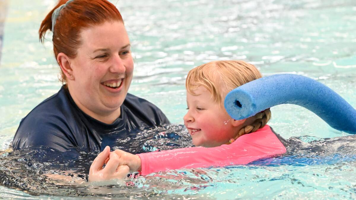 Everyone is being encouraged to learn to swim as summer approaches, with instrurctor Melissa Bramley and Zoe. Picture by Darren Howe 