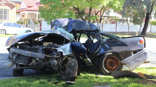 The wreck of Bryden Smith's car after he lost control in Ellis Street, Flora Hill, last year. Picture by Jenny Denton 