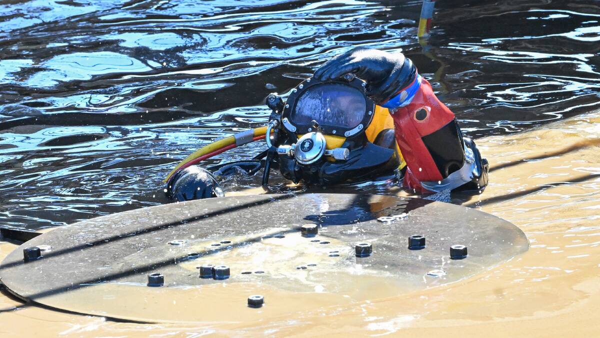 Stay up to date with the latest Bendigo news here - and catch up on the week's best stories such as the Bendigo Water Reclamation Plant divers who had an unenviable task. Picture by Darren Howe 