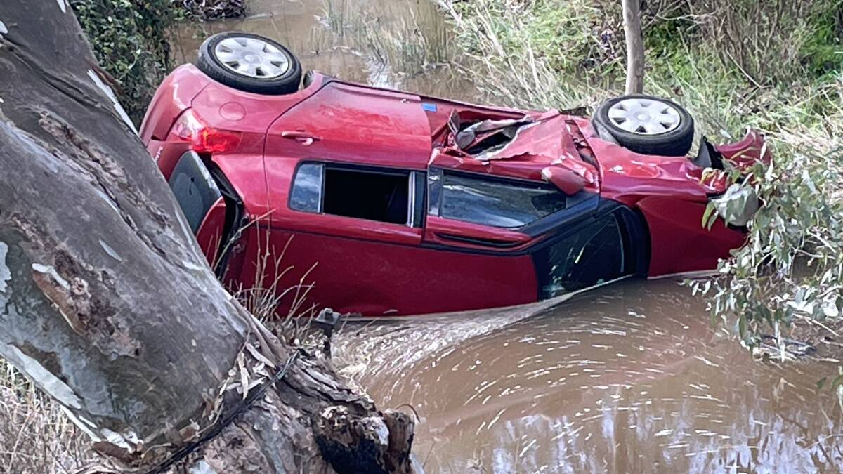 CREEK CRASH: A driver is in Bendigo hospital for observation after crashing into a Newstead creek in a single-vehicle accident around 2pm on Thursday. Picture: DARREN HOWE 