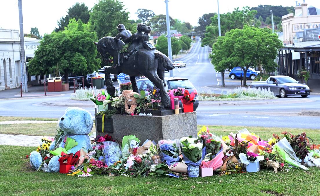 Flowers and toys left at the corner of Albert and Vincent streets Daylesford, three days after an accident that killed five people including two children. Picture by Kate Healy