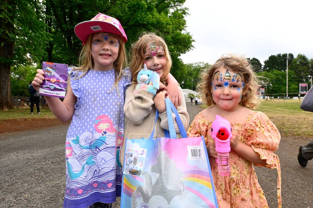 Poppy, Ellen and Mimi get into the spirit of the Daylesford Show on Saturday. Picture by Adam Trafford.
