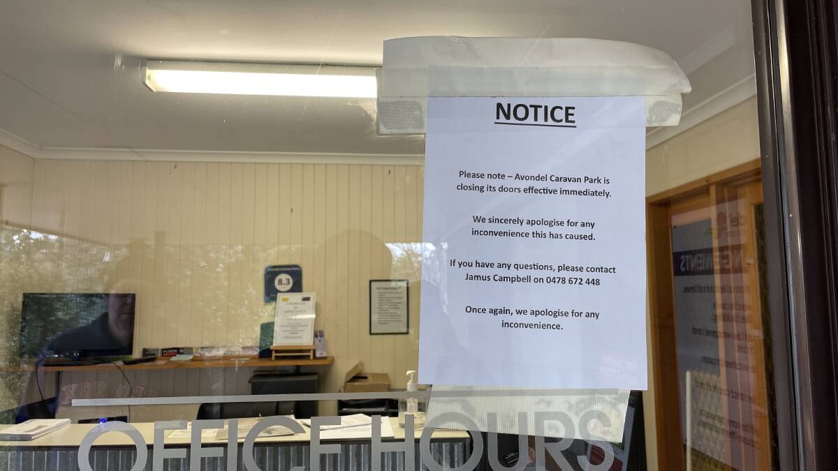 A notice at the Avondel Caravan Park stating the facility has closed, effective immediately. 
