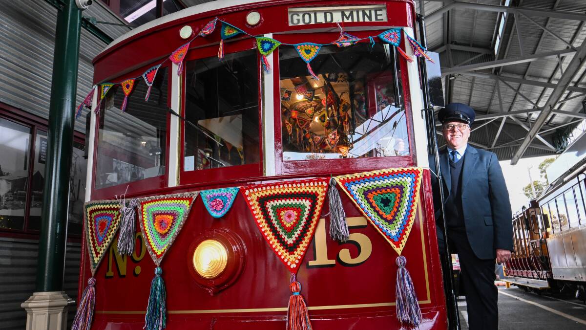 Driver Chris Pollard with the Yarn Bomb tram. Picture by Darren Howe
