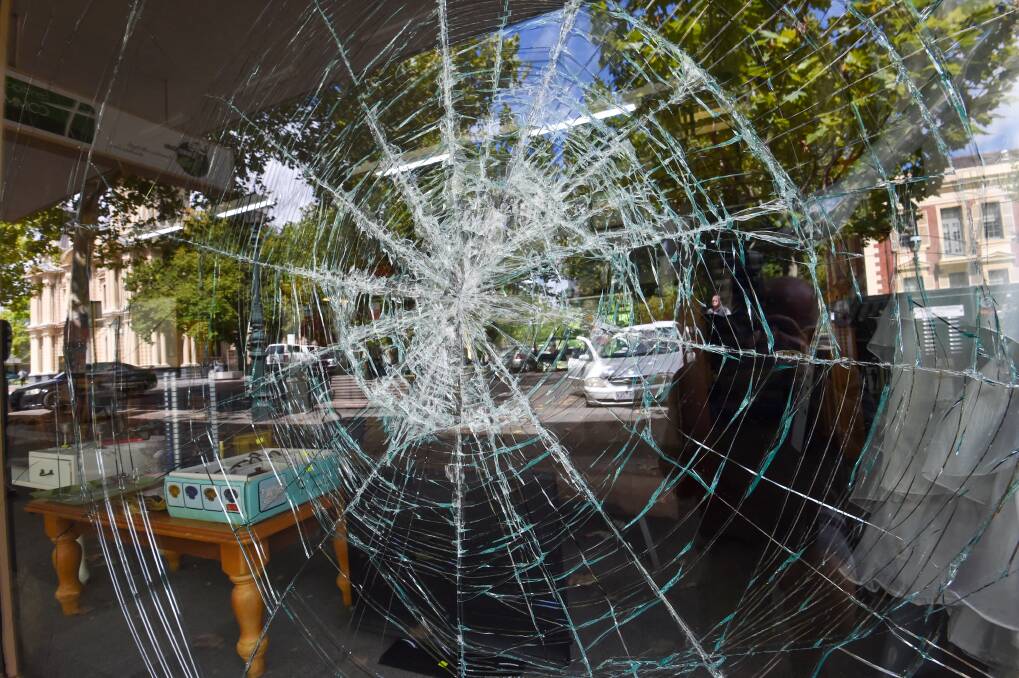 A window at the Bendigo Baptist Community Care op shop was smashed on Tuesday. Picture by Darren Howe