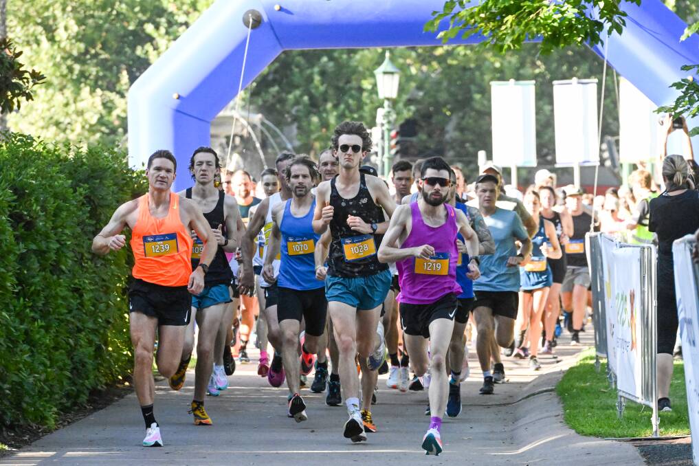 Runners take off for the start of the 10-kilometre fun run. Picture by Darren Howe