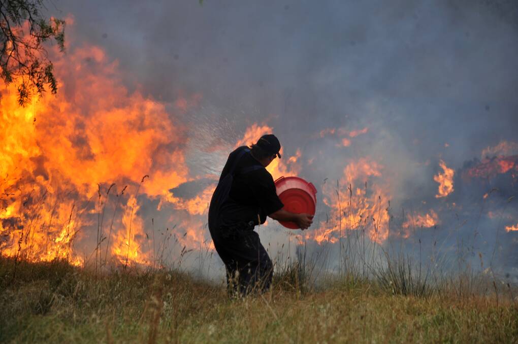 Mr Smith said members of the community did anything they could to try stop the fires. Picture by Peter Hyett