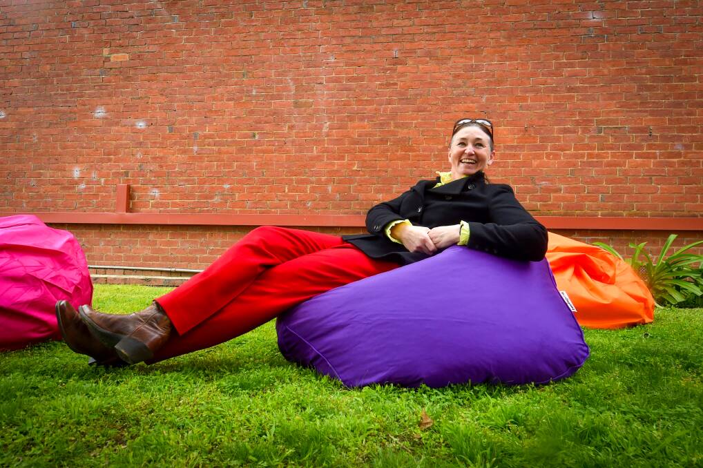 Bendigo Venues and Events manager Julie Amos relaxes in the newly refurbished Dudley House garden. Picture by Darren Howe