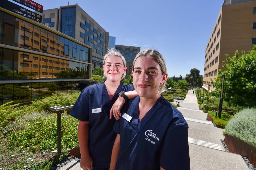 Twins Steph and Alex Milsom have started Bendigo Health's general graduate nurse program. Picture by Darren Howe