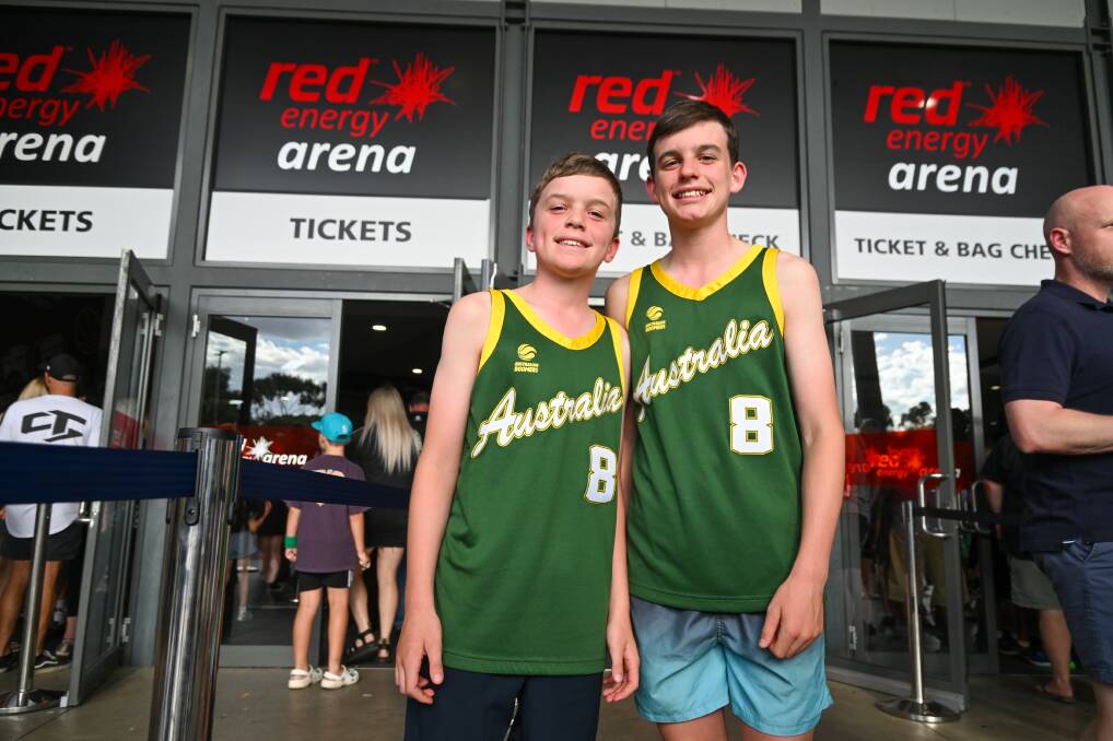 Charlie and Archie donned Australia jerseys to watch the Boomers take on Korea at Red Energy Arena on Thursday night. Picture by Enzo Tomasiello