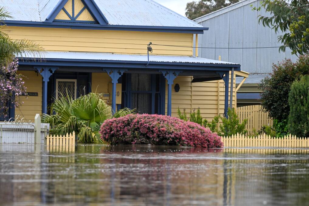 A house in Rochester during October's floods. Picture by Darren Howe