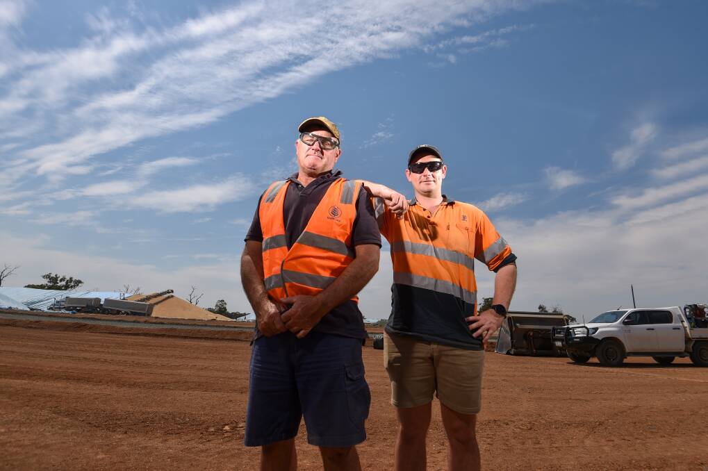 Steve Manley, left, is working through his 40th harvest with GrainCorp. Picture by Darren Howe