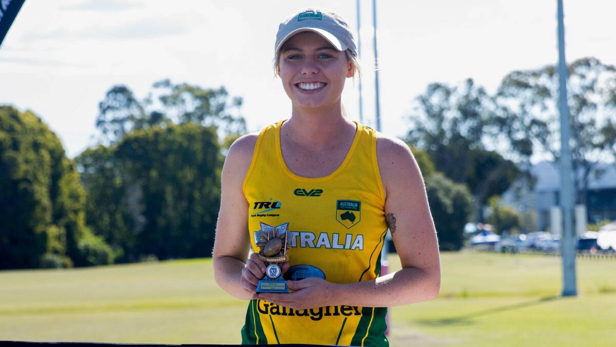 Maddy Morrall after winning the Touch Rugby League World Championship on the Australian Women's team. She also won women's player of the tournament. Picture via Maddy Morrall