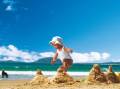 Child plays on Mooloolaba Beach, Queensland. The area has seen massive growth as city dwellers seek a seachange. Picture Tourism Queensland