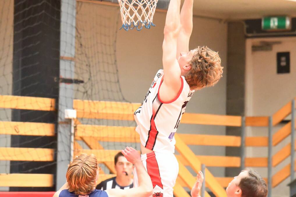 Fletcher Burger dunks during the round eight CBL match against Horsham at the Ararat Fitness and Leisure Centre on Saturday, November 25. Picture by Lucas Holmes