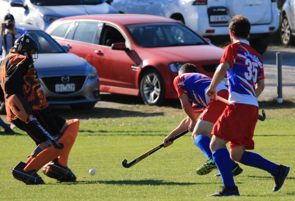 Men's hockey grand final action. Picture by Blake Lee