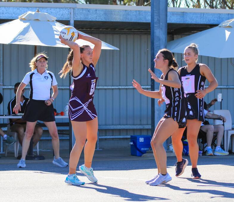 A grade grand final netball action. Picture by Blake Lee