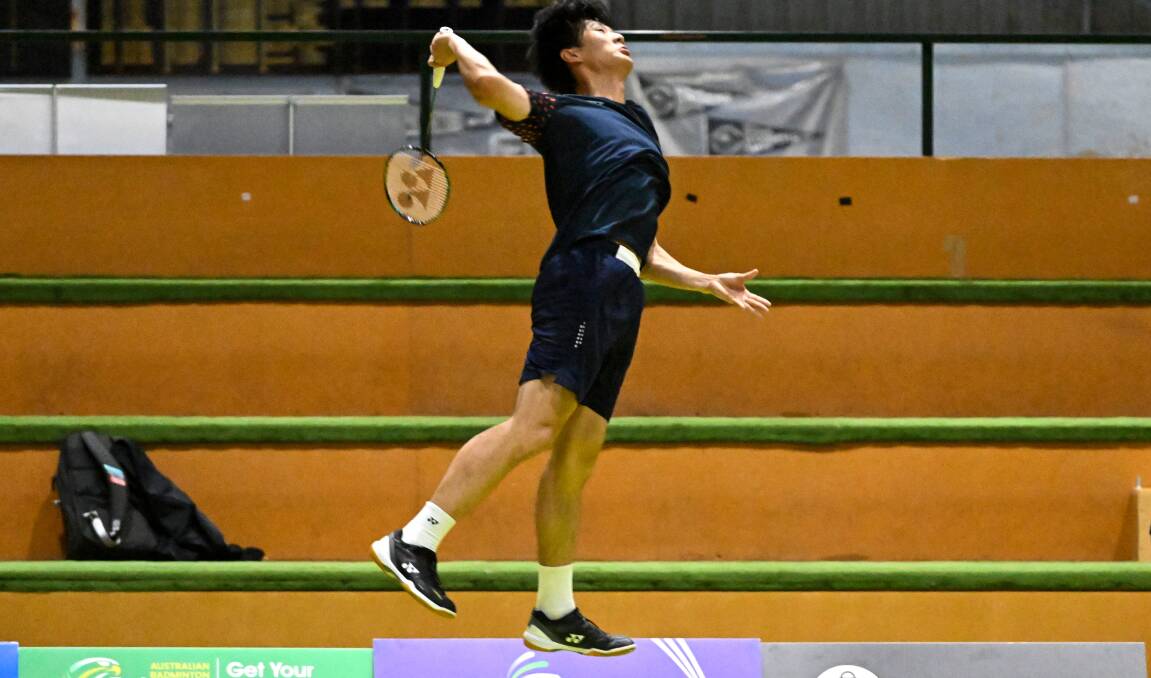 Rayne Wang who lost the men's doubles final serves earlier in the week. Picture by Darren Howe