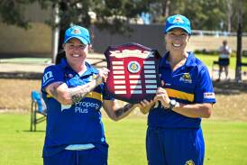 Golden Square captain Tammy Norquay (left) and coach Sarah Mannes hold aloft the Lisa Chesters Shield. Picture by Enzo Tomasiello 