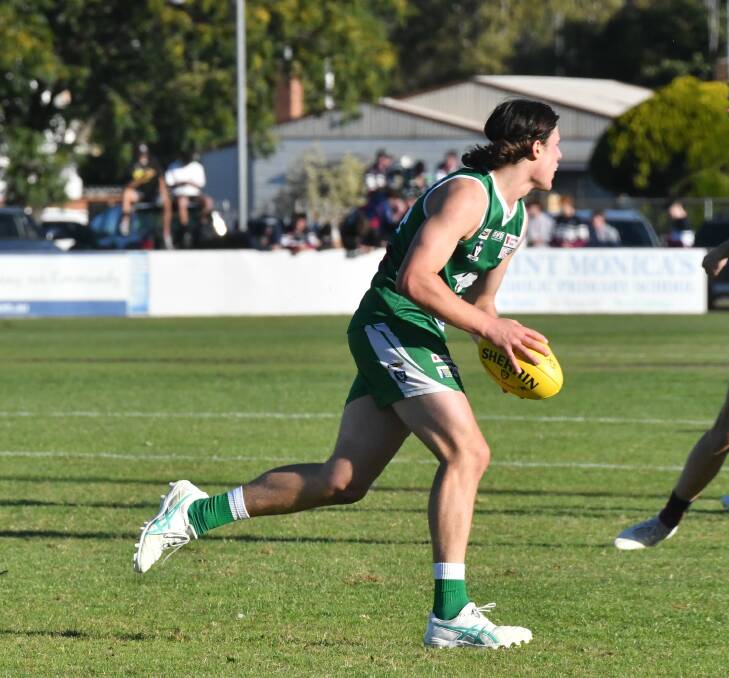 Kangaroo Flat's Campbell Smith assesses his options downfield. Picture by Adam Bourke