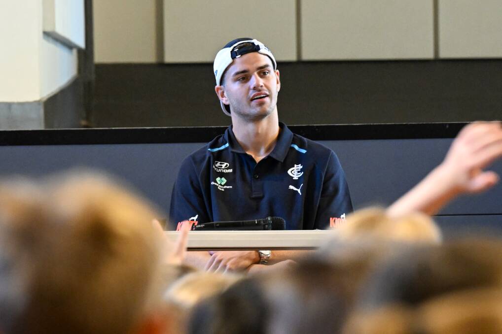 Carlton defender Brodie Kemp answers questions from students at St Killian's Primary School. Picture by Darren Howe 