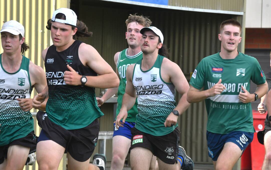 Roos players putting some miles in the legs earlier this pre-season. Picture by Adam Bourke