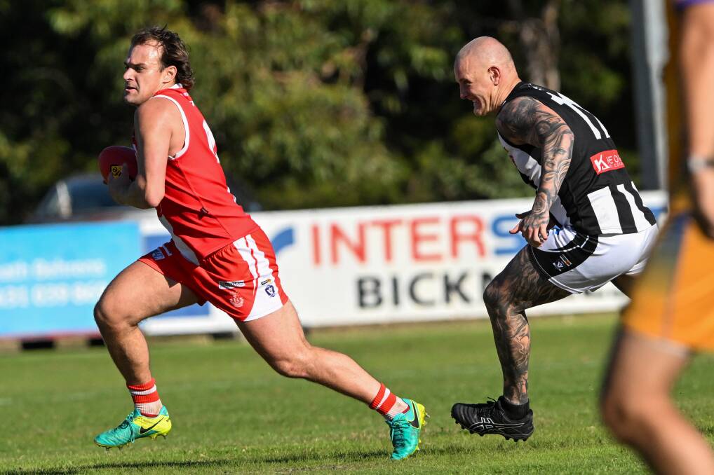 South Bendigo recruit Anthony Zimmerman explodes away from Matthew Filo. Picture by Darren Howe