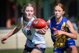 Bendigo Pioneer Jasmine Short reaches for the footy during her sides clash against Western Jets on Sunday. Picture by Darren Howe