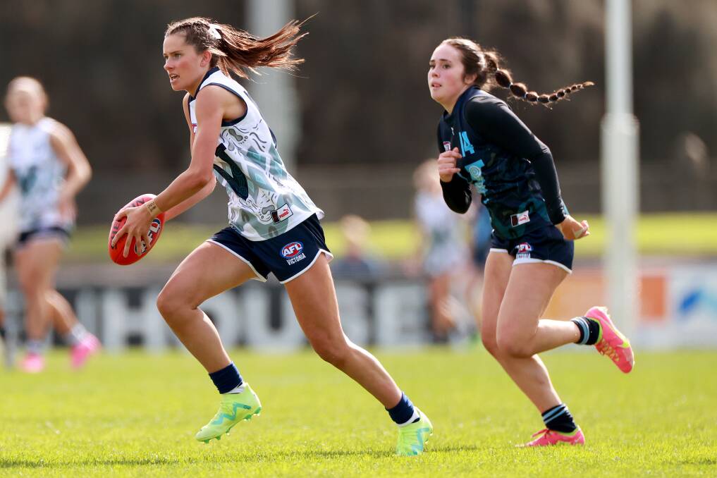 Bryde O'Rourke uses her speed to escape an opponent while playing for Vic Country in 2023. Picture by Getty Images