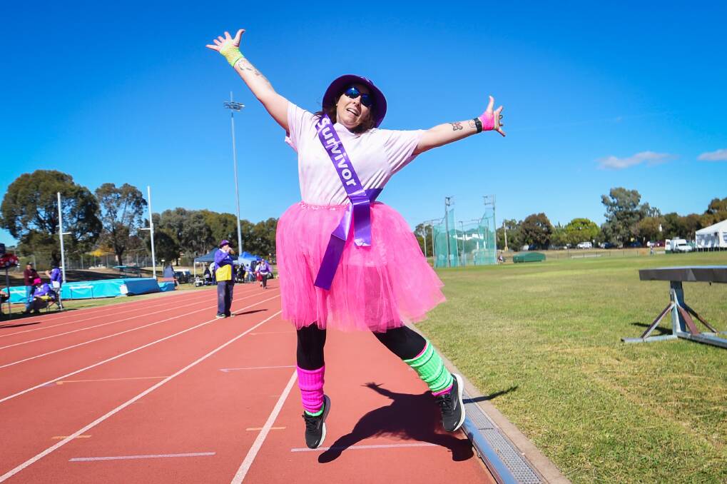 Michelle Weston jumps for joy at Bendigo 2024 Relay for Life. Picture by Darren Howe