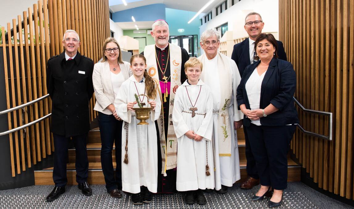 Left to right - Director of Catholic Education for the Diocese of Sandhurst, Paul Desmond, Bendigo East MP Jacinta Allan, Sienna Raco, Bishop Shane Mackinlay, Flynn Stevens, Fr Andrew Fewings, Principal Tim Moloney and Deputy Principal Grace Scalora in the new learning centre at St Francis of the Fields. Picture by Brendan McCarthy.