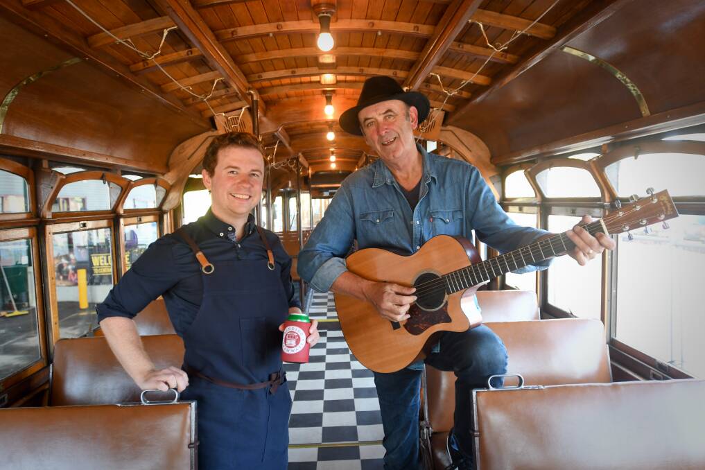 Jacob Amarant and Chris DeAraugo on the Groove Tram. Picture by Noni Hyett 