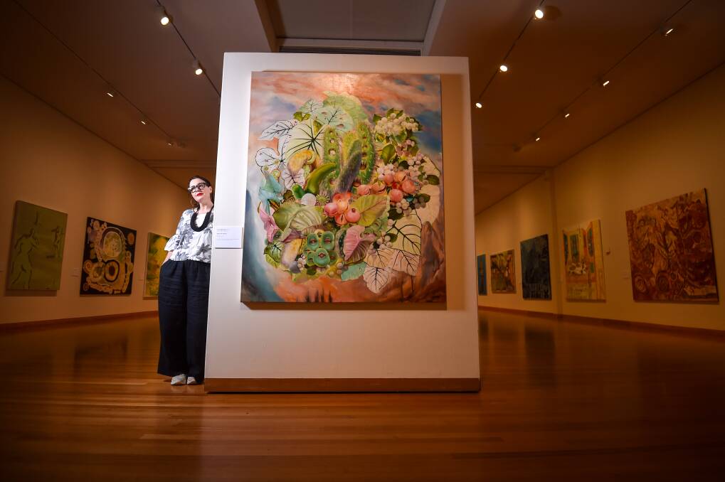 Curator Lauren Ellis in the 2023 Arthur Guy Memorial Painting Prize exhibition hall. Picture by Darren Howe