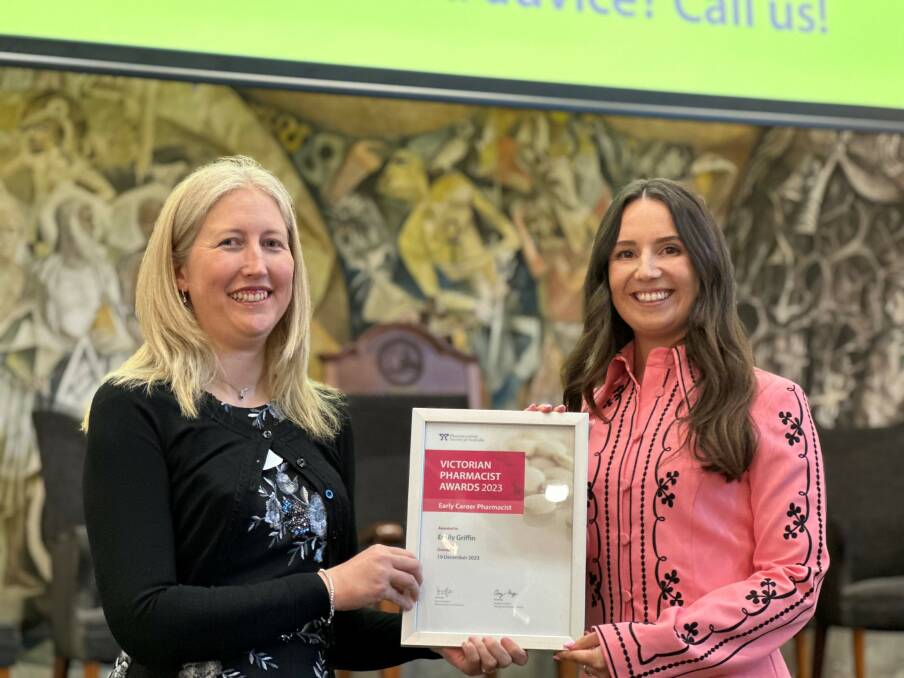 Pharmaceutical Society of Australia Victoria Branch president Amy Page presents Bendigo raised Emily Griffin with Early Career Pharmacist of the Year award. Picture supplied