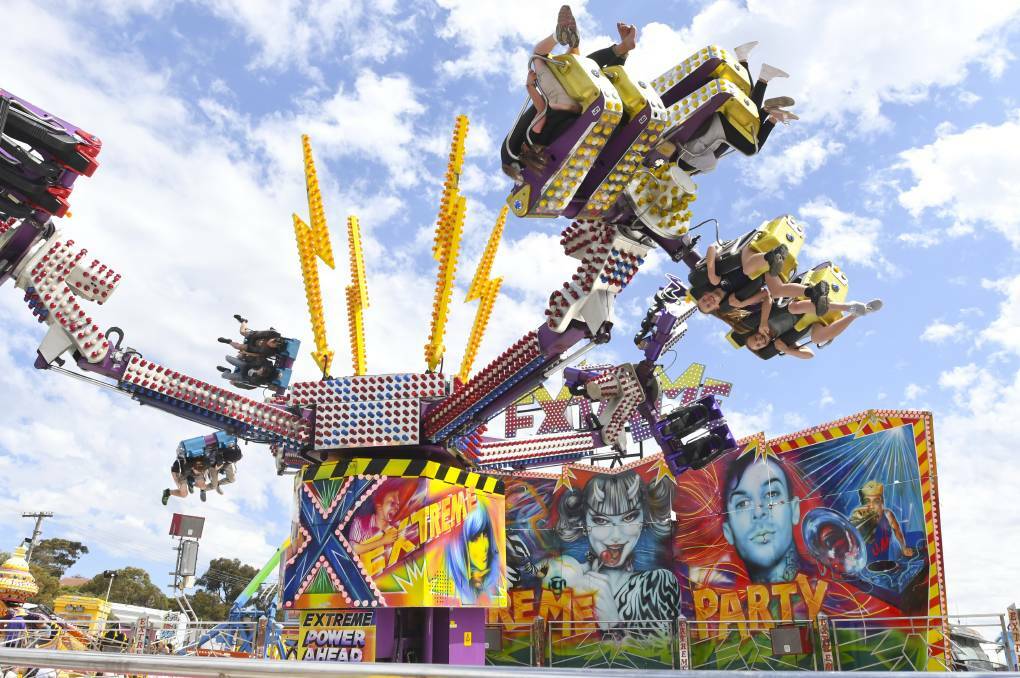 Showgoers enjoy Extreme Party ride at the 2017 Bendigo Agricultural Show. Picture by Noni Hyett