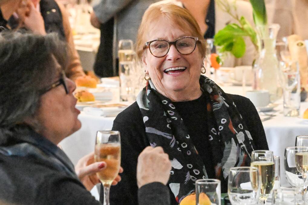 Carol Johnson and Lyn Giblett share a laugh at the Women in Wool Luncheon. Picture by Darren Howe