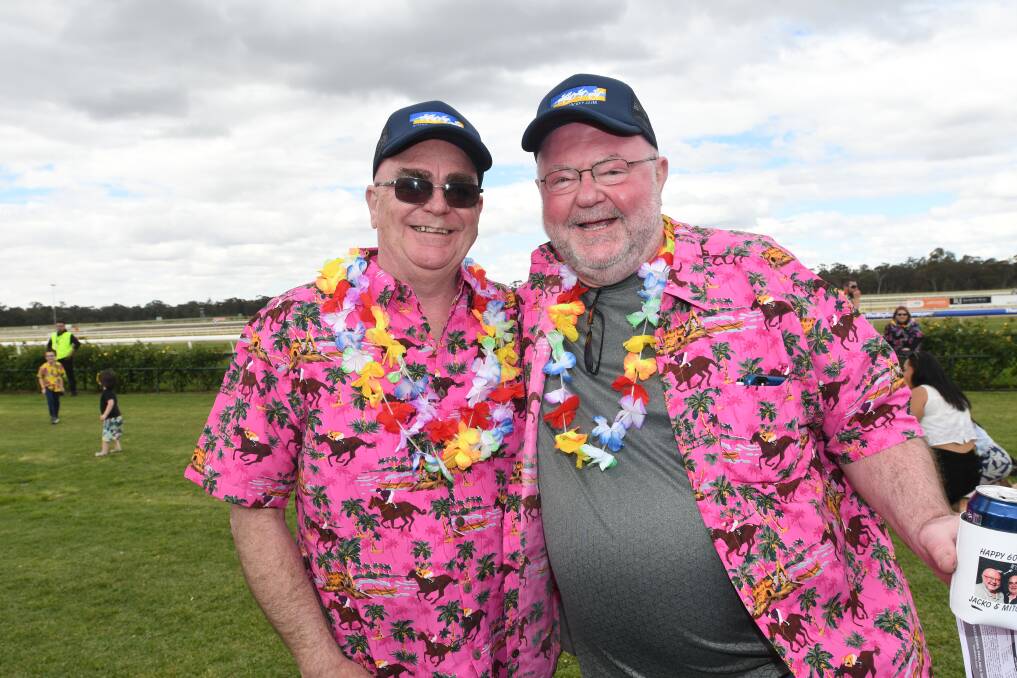 Gary Mitchell and Garry Jackson at the beach party race day in 2019. Picture by Noni Hyett