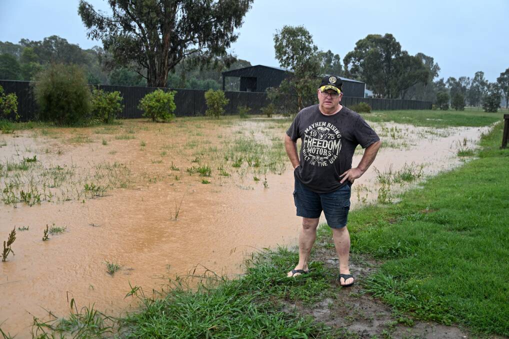 Mr Harrison on his property during the January flood event in Huntly. Picture by Enzo Tomasiello