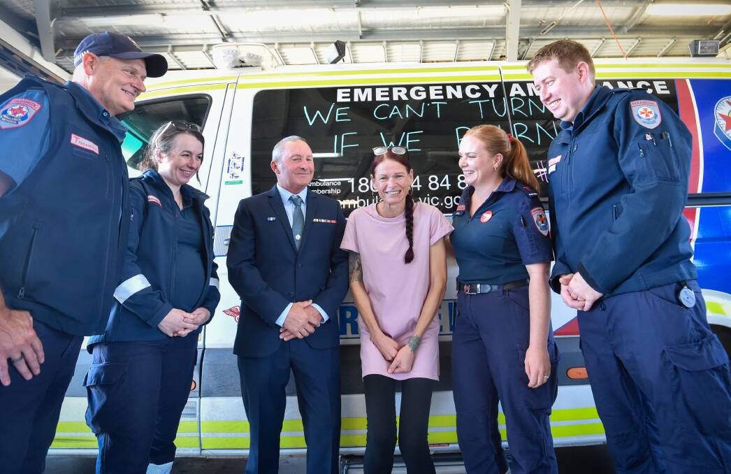 Astrid Zegers is re-united with paramedics and police who saved her life after a motorbike crash. Paramedics Wayne Nicol and Kayla Watson, retired Leading Senior Constable Peter Bullock, Astrid Zegers, and paramedics Fran Nadin and Andrew Jochs. Picture by Darren Howe