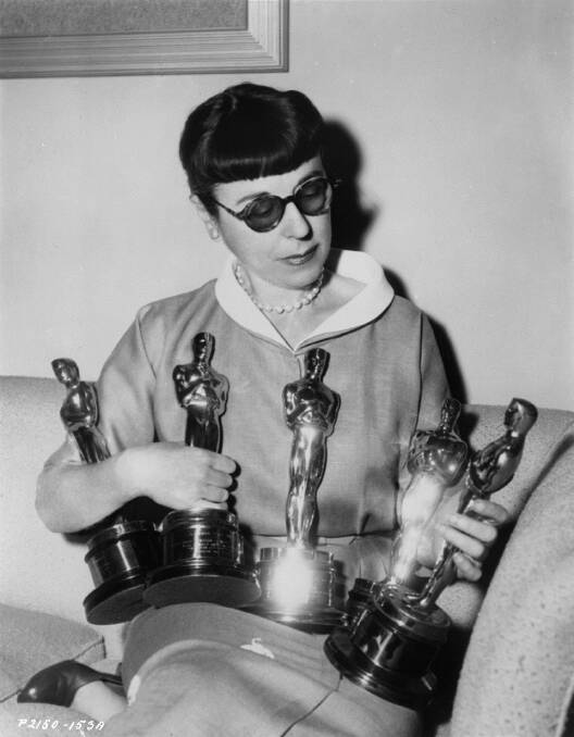 ACCOLADES: The prolific Edith Head with five of her Academy Awards. She was the only woman to win a total of eight Oscars during her career and worked on almost 1000 films. Picture: Paramount Pictures
