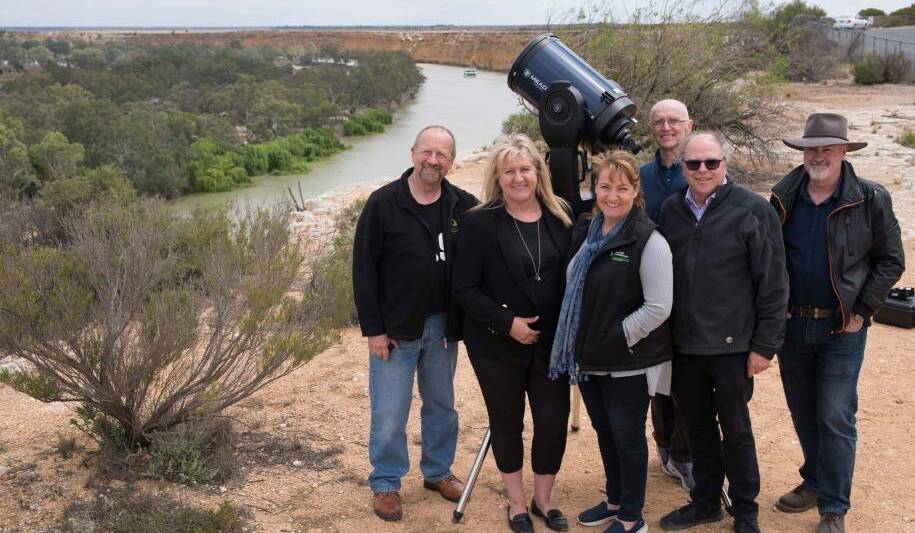 ACCREDITED: Chris Tugwell, Debbie Alexander, Julie Bates, Martin Lewicki, David Bennett and Paul Haese at the Big Bend Lookout, which is part of the Reserve. Photo: Dani Brown.