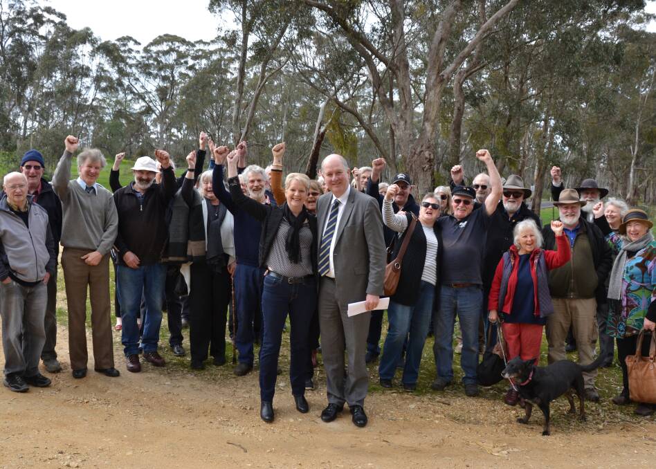 Locals celebrate the decision to knock back the proposed Tarran Valley Estate with Member for Bendigo West Maree Edwards and Planning Minister Richard Wynne in Maldon on Wednesday. Picture: CONTRIBUTED
