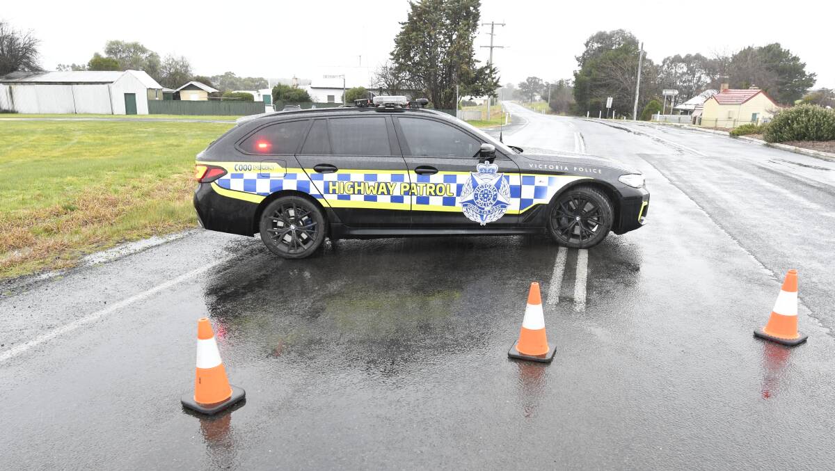 Police block off Maryborough-Ballarat Road on Thursday morning. Picture: Lachlan Bence.