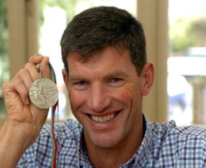 Gary Gullock, pictured with his silver medal in 2004.