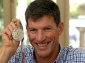 Gary Gullock, pictured with his silver medal in 2004.