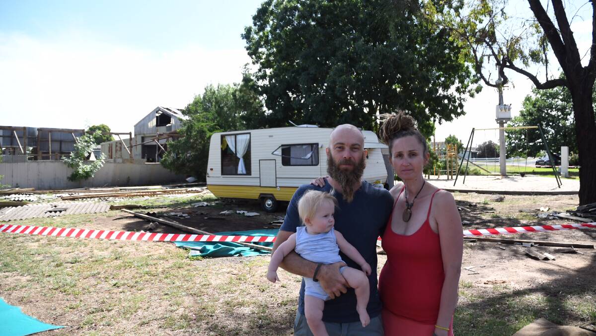 The Potters in front of their caravan. Picture: NATALIE CROXON