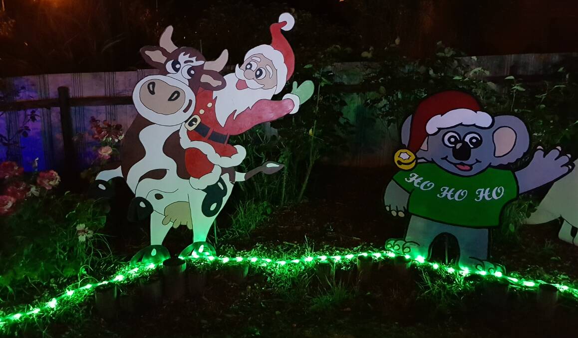 The Christmas cow, Santa, and a Christmassy koala. Picture: CONTRIBUTED